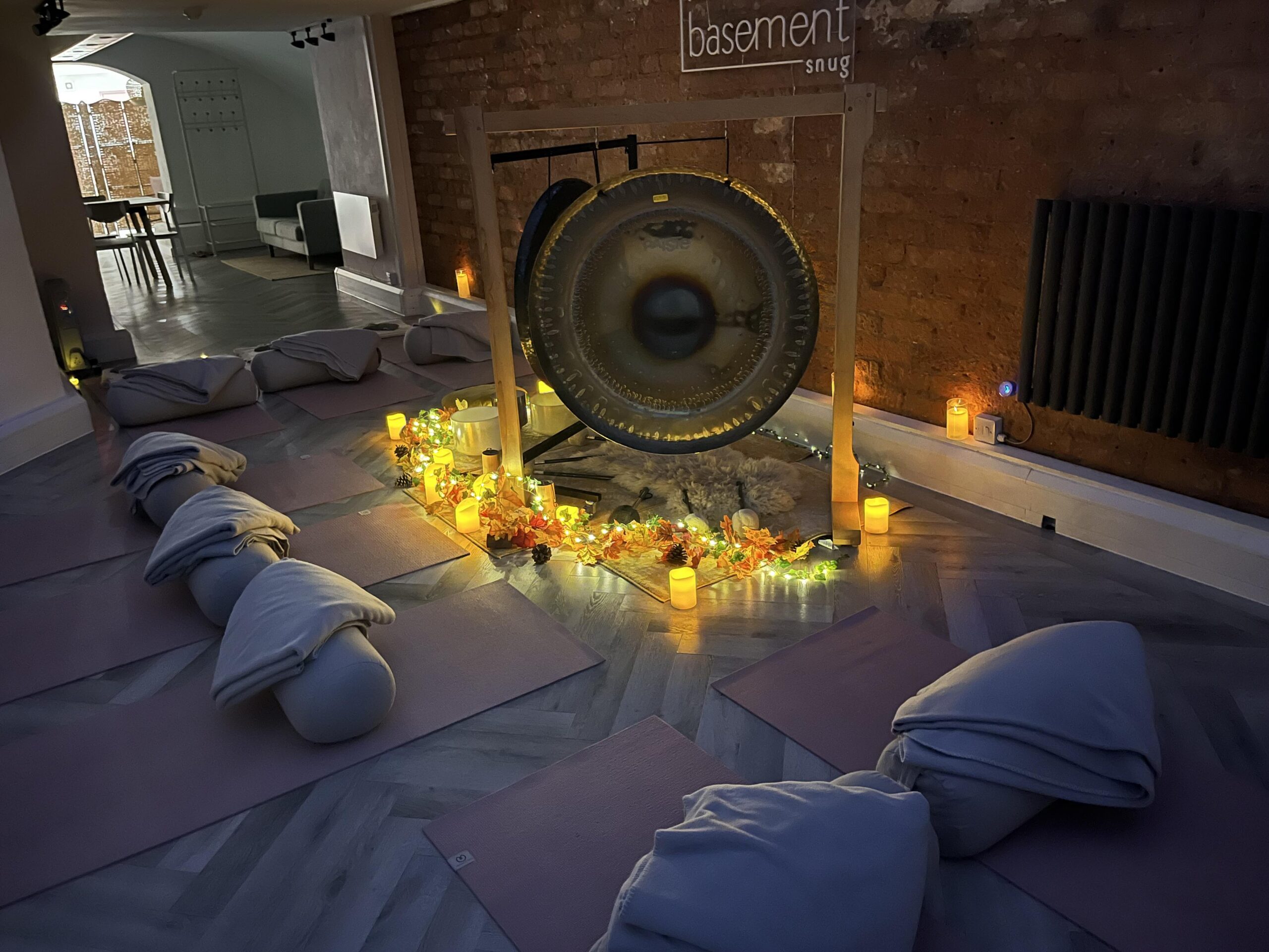 Image of gong setup for sound healing at Basement snug<br />
