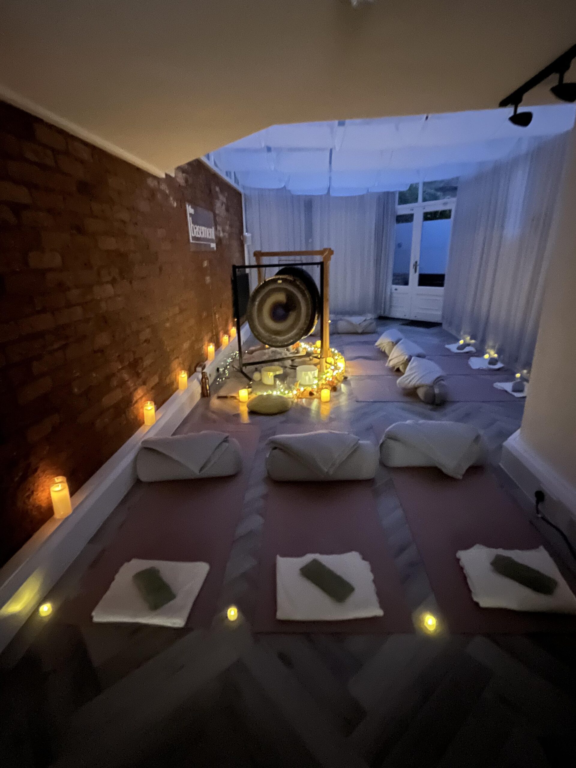 Image of Basement Snug in Kenilworth setup for sound healing with Geet Fateh Kaur in Autumn